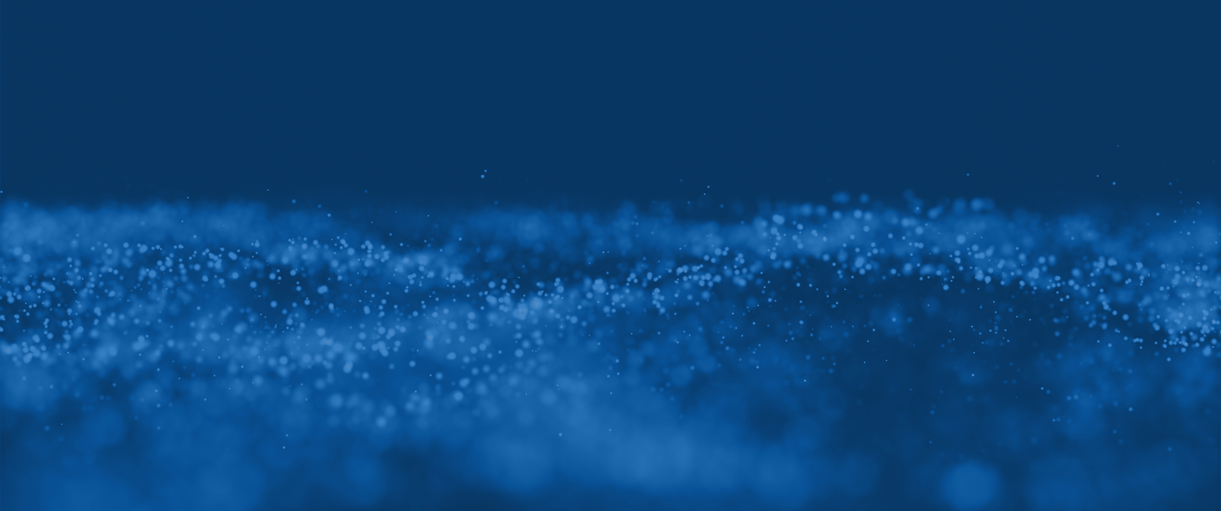 Blue background with small, scattered white particles.