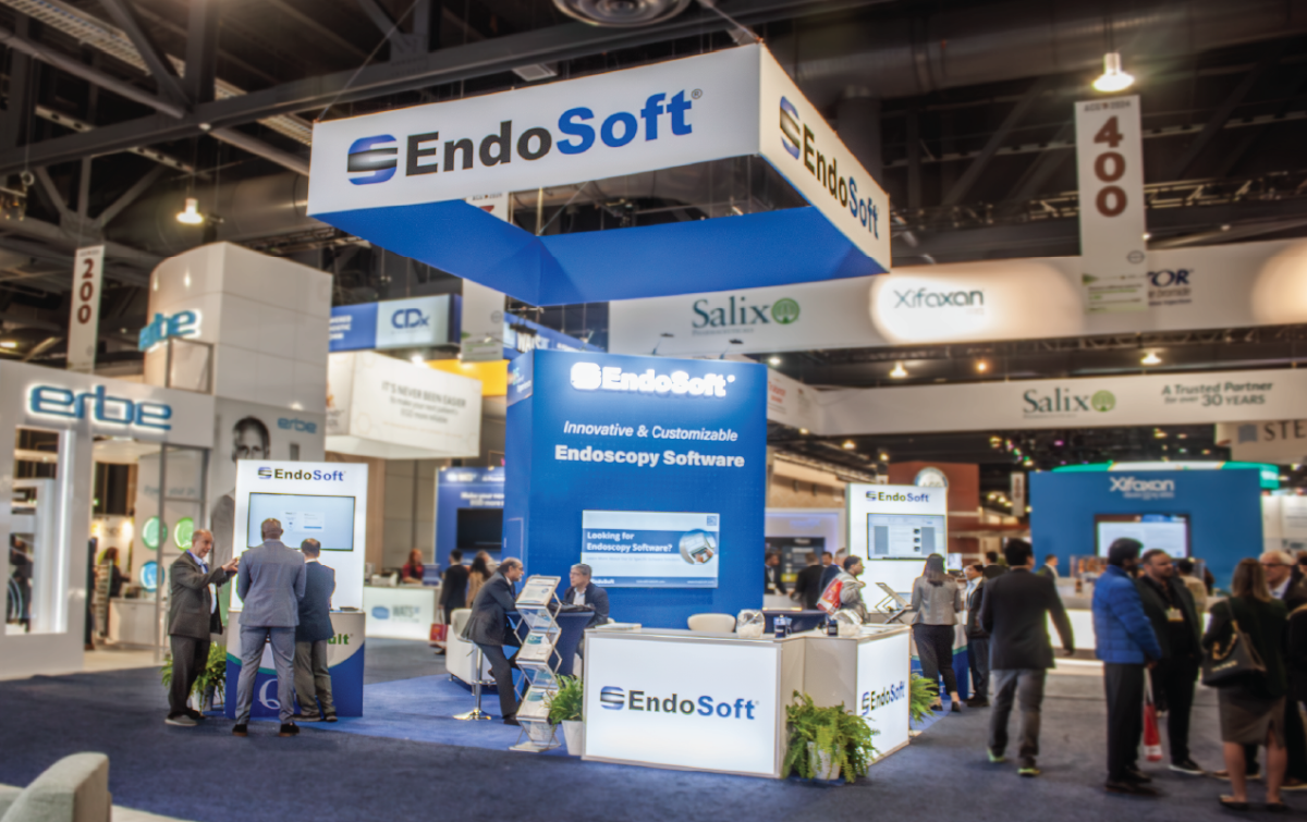 A photo of the EndoSoft booth, amongst other participants. Multiple interested attendees are engaging with EndoSoft exhibitors.